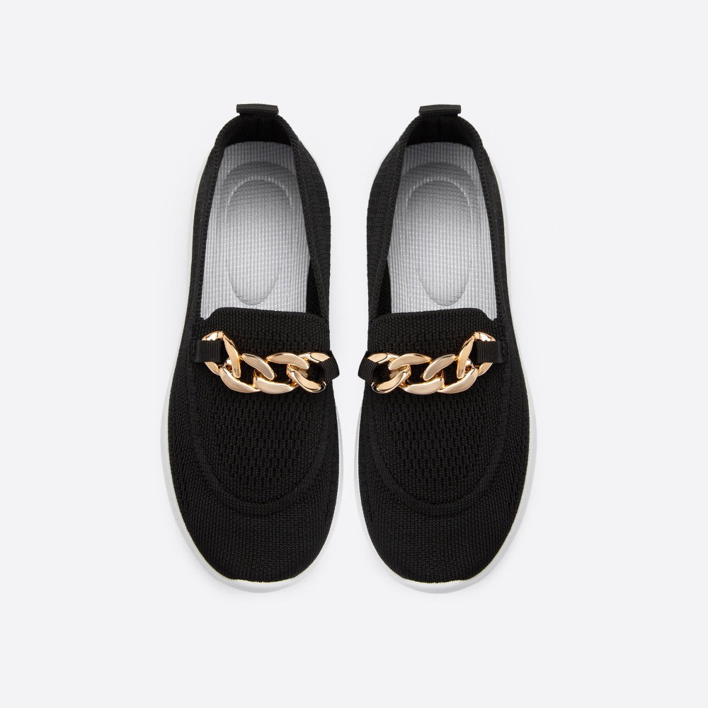 styled and breathable shoes with a gold button on top.