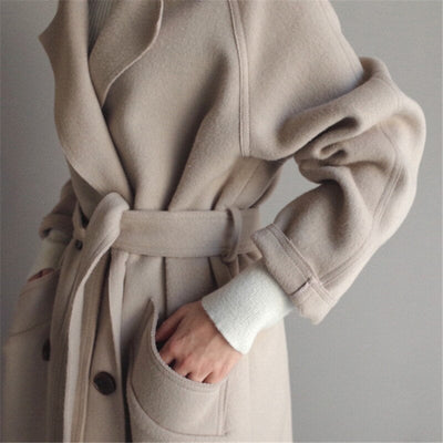 Model wears long wool coat for winter